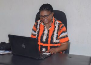 a lady on a computer